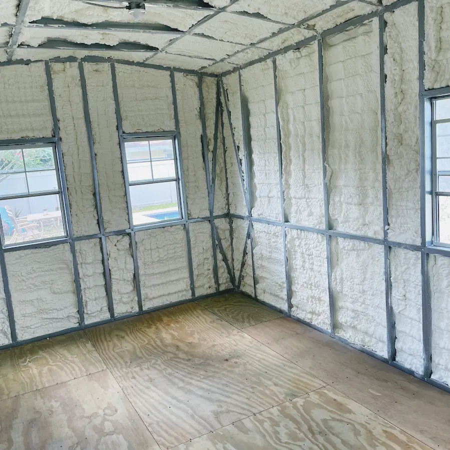 Closed-cell spray foam insulation applied to wall cavities in a residential project in Bull Mountain